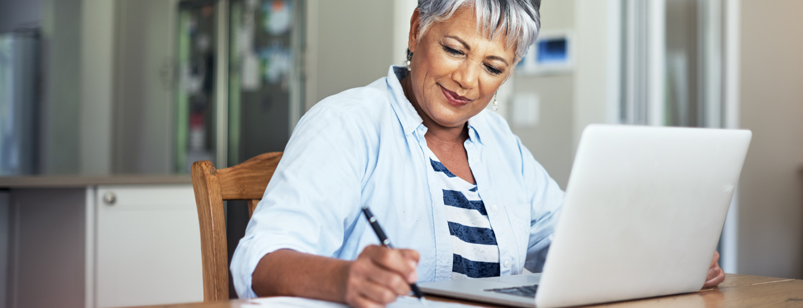 Woman using laptop computer