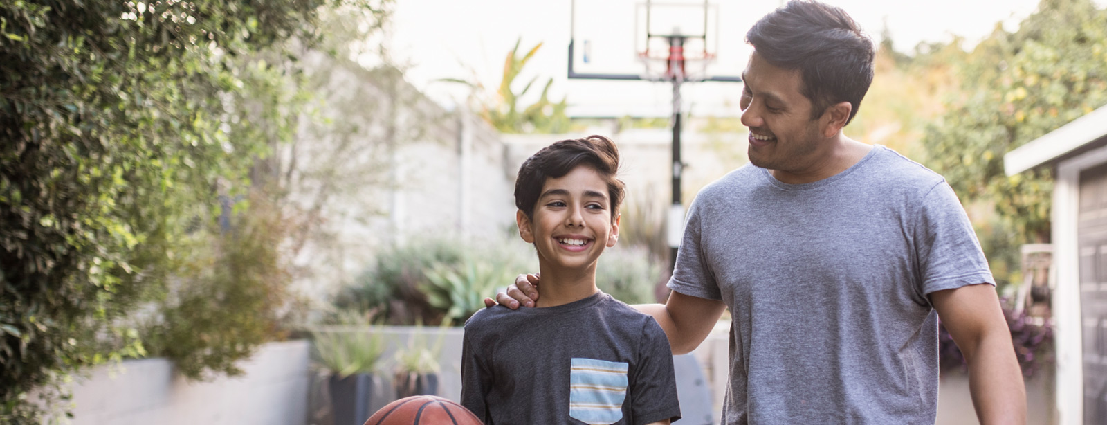 Father and son with basketball